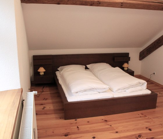 "Appartement de vacances Zum alten Landrat" Chambre à coucher en haut